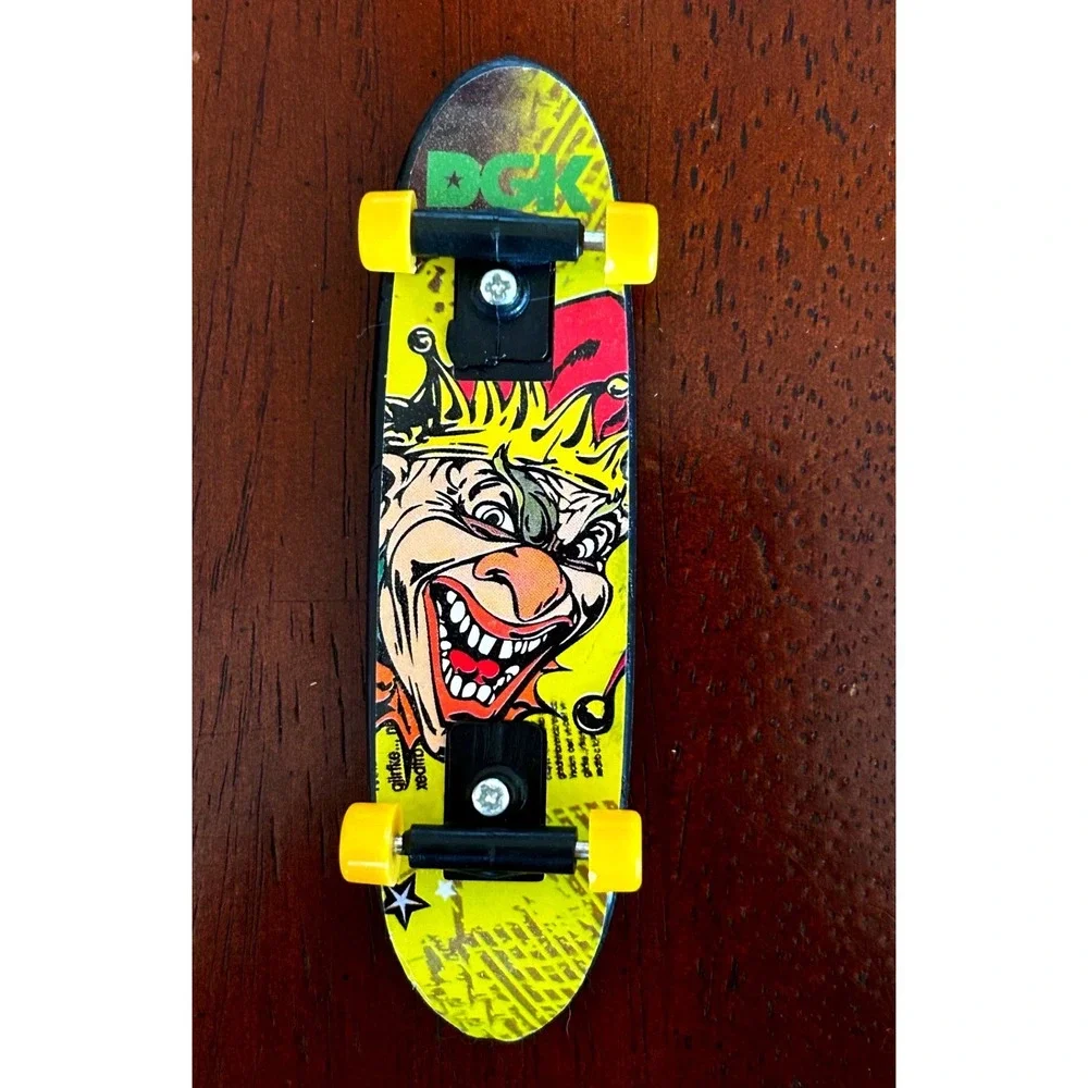 DGK Jester Fingerboard Tech Deck Toy Yellow Wheels Clown Graphic Miniature Skate